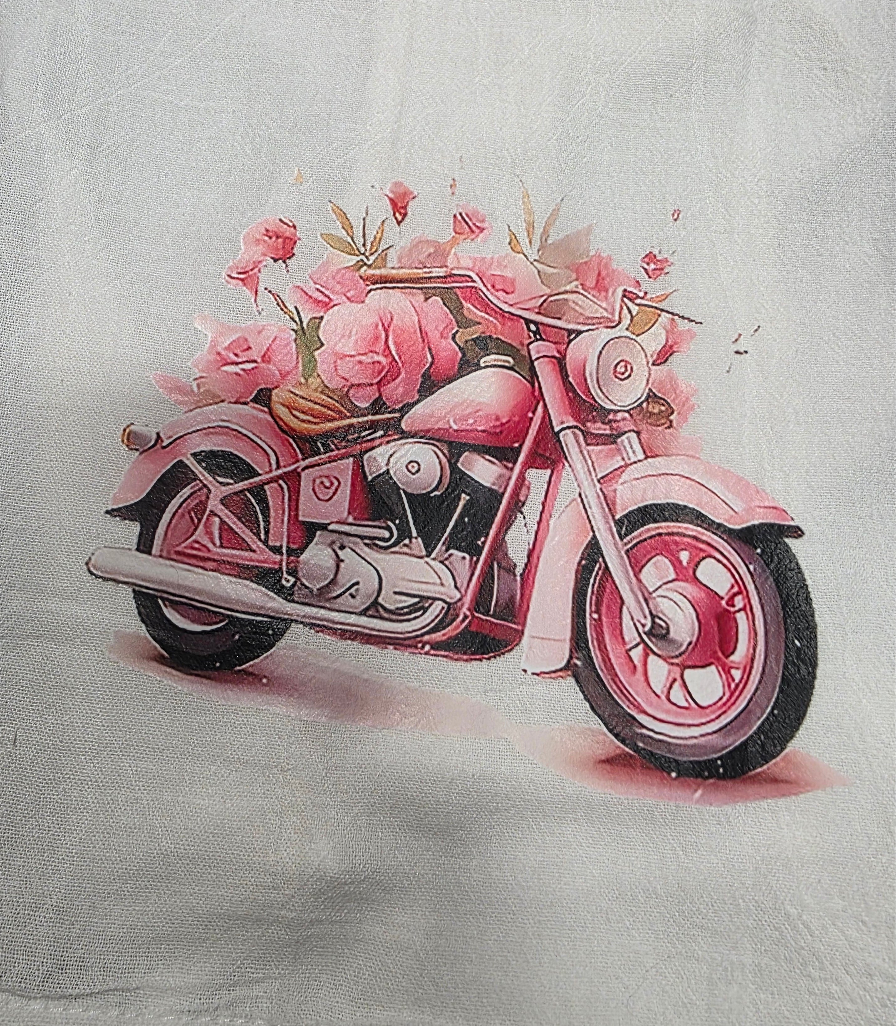 White pillowcase with a pink motorcycle and floral design 