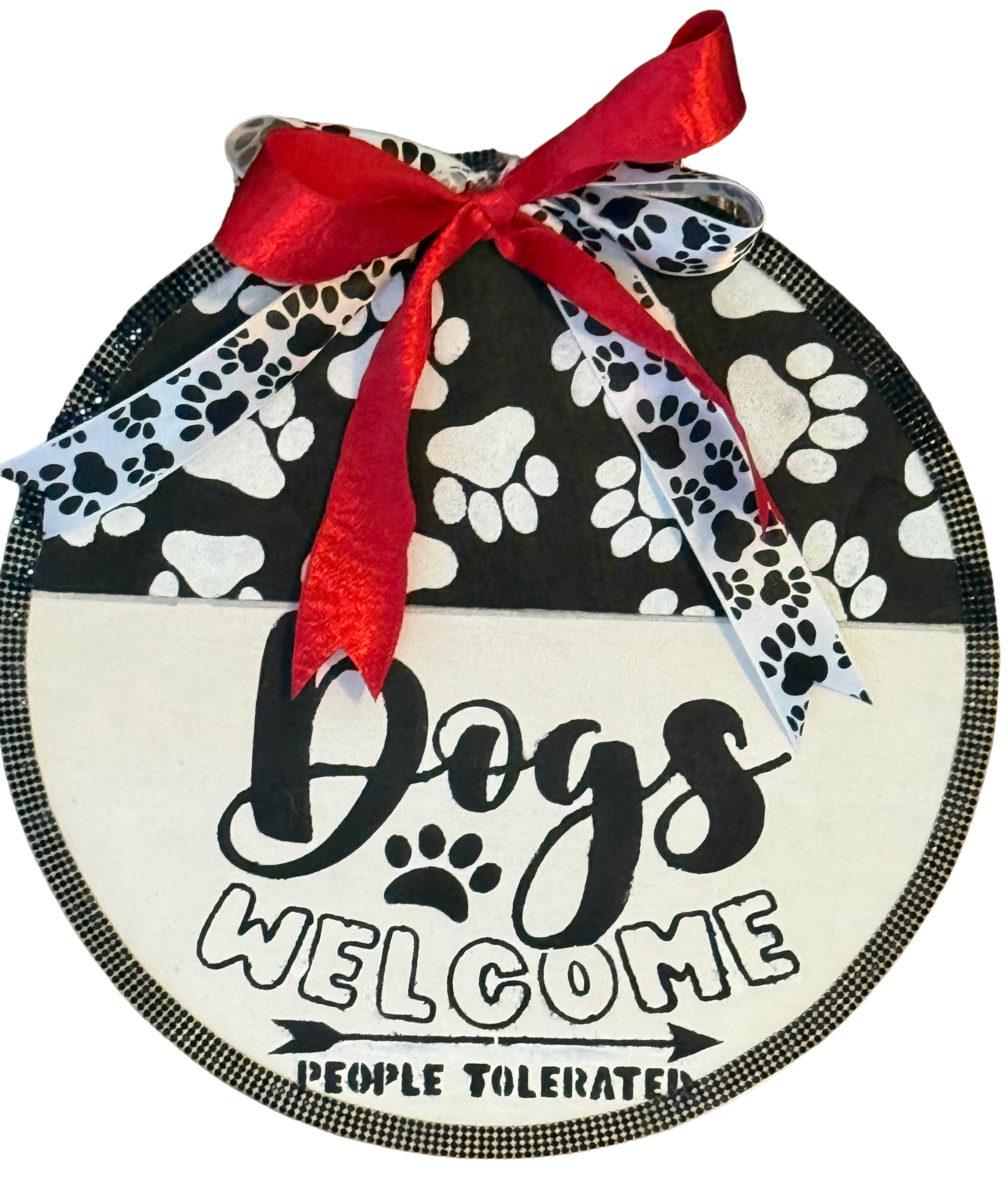 Round sign with paw print pattern, red ribbon, and 'Dogs Welcome People Tolerated' text on a white background.