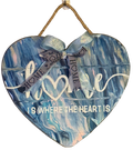 Heart-shaped wooden plaque with blue marbled design and text on a white background