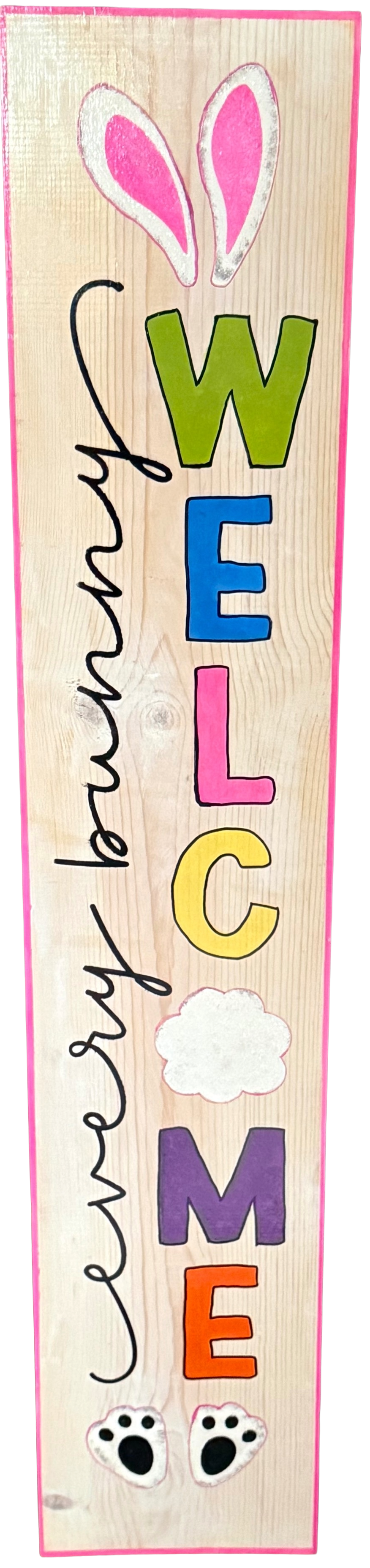 Wooden sign with colorful text 'Welcome every bunny' on a white background