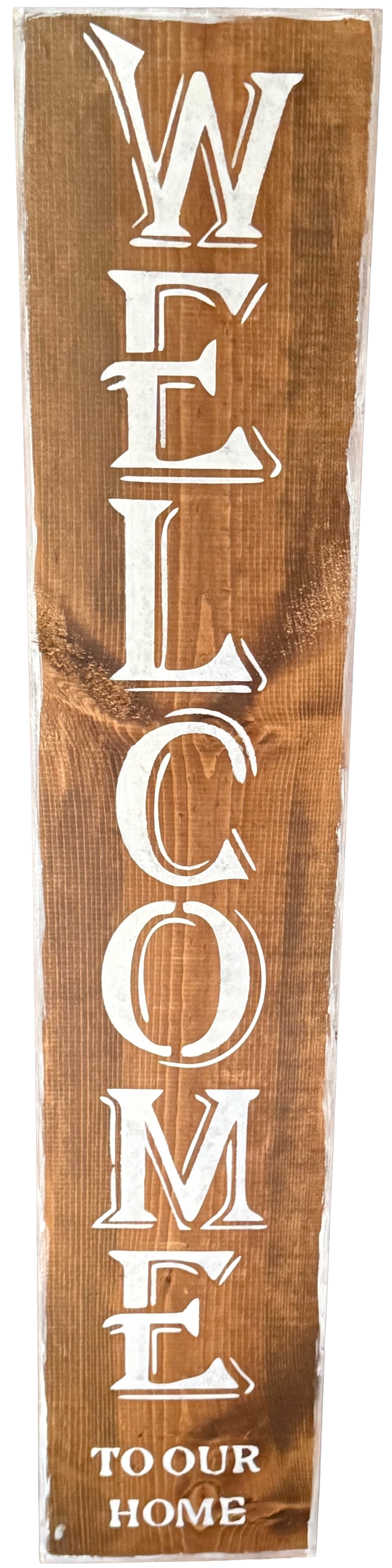 Wooden sign with 'Welcome to our home' text in white letters