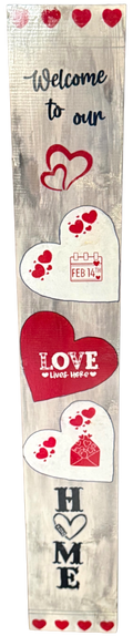 Decorative wooden sign with hearts and text on a white background