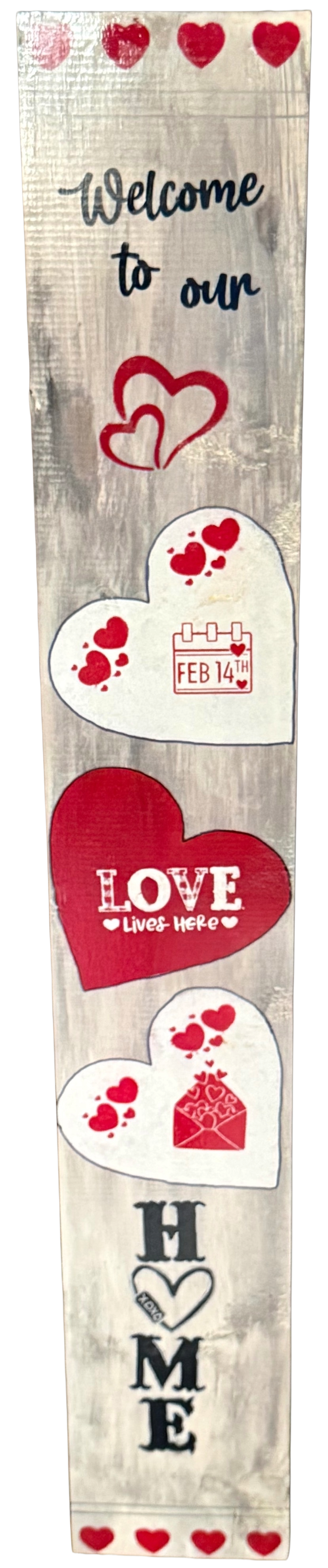 Decorative wooden sign with hearts and text on a white background
