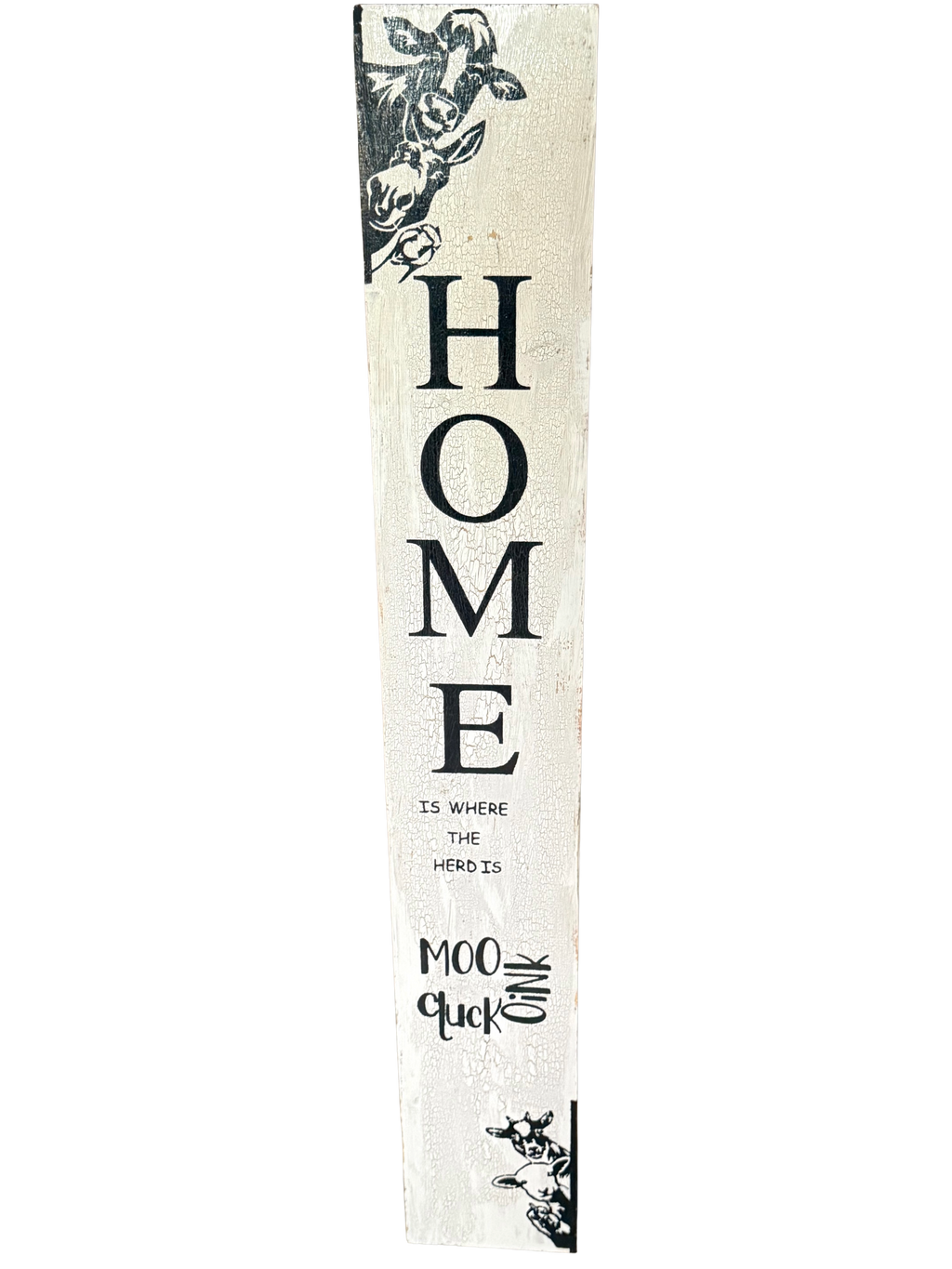 Decorative sign with 'HOME is where the heart is' text on a white background