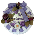 Decorative wreath with flowers and a 'Welcome' sign on a white background