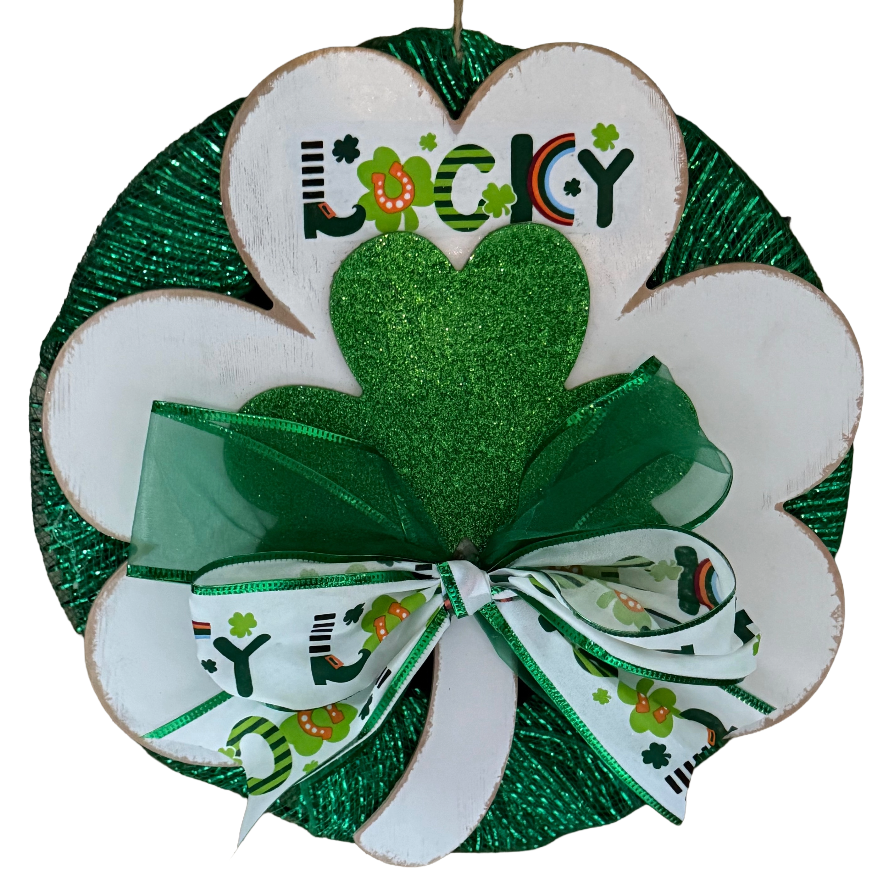 Decorative shamrock wreath with 'Lucky' text and green bow on a white background