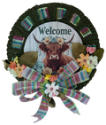 Decorative wreath with a cow illustration and 'Welcome' text on a white background
