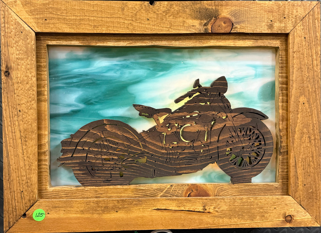 Lighted Shadow Box with scroll saw carving of a Harley motorcycle done by hand with a rustic wooden frame.