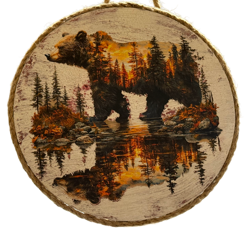 Wooden plaque with a bear and forest design on a white background