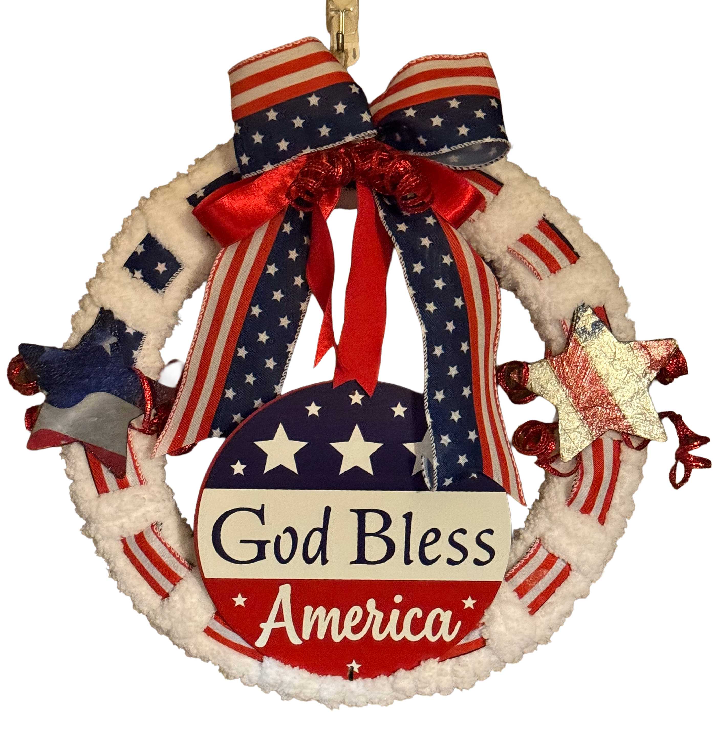 Decorative wreath ornament with 'God Bless America' text and American flag design on a white background.