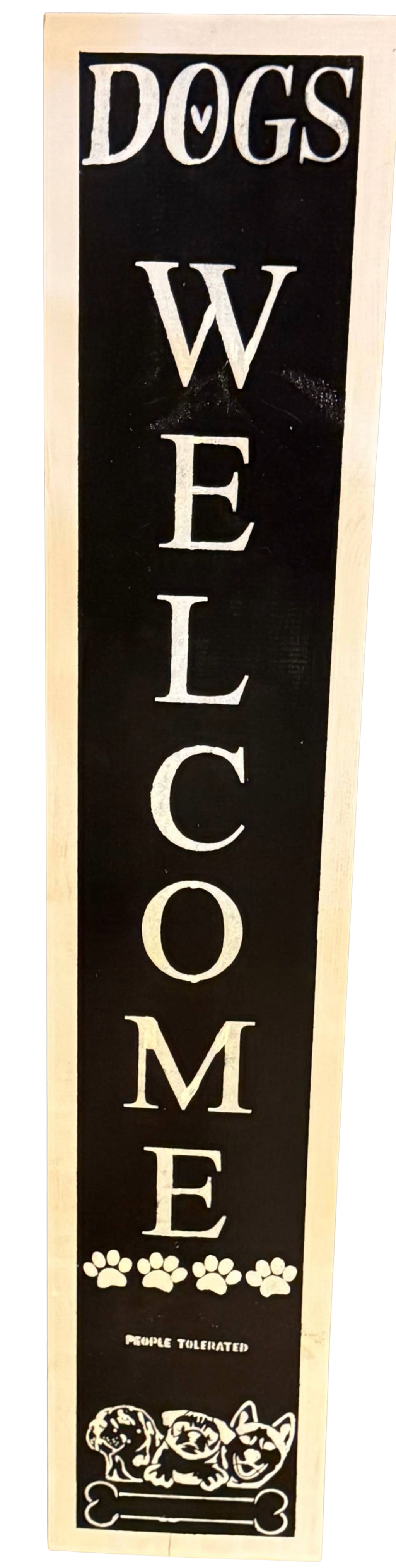 Vertical sign with 'DOGS Welcome' text on a black background