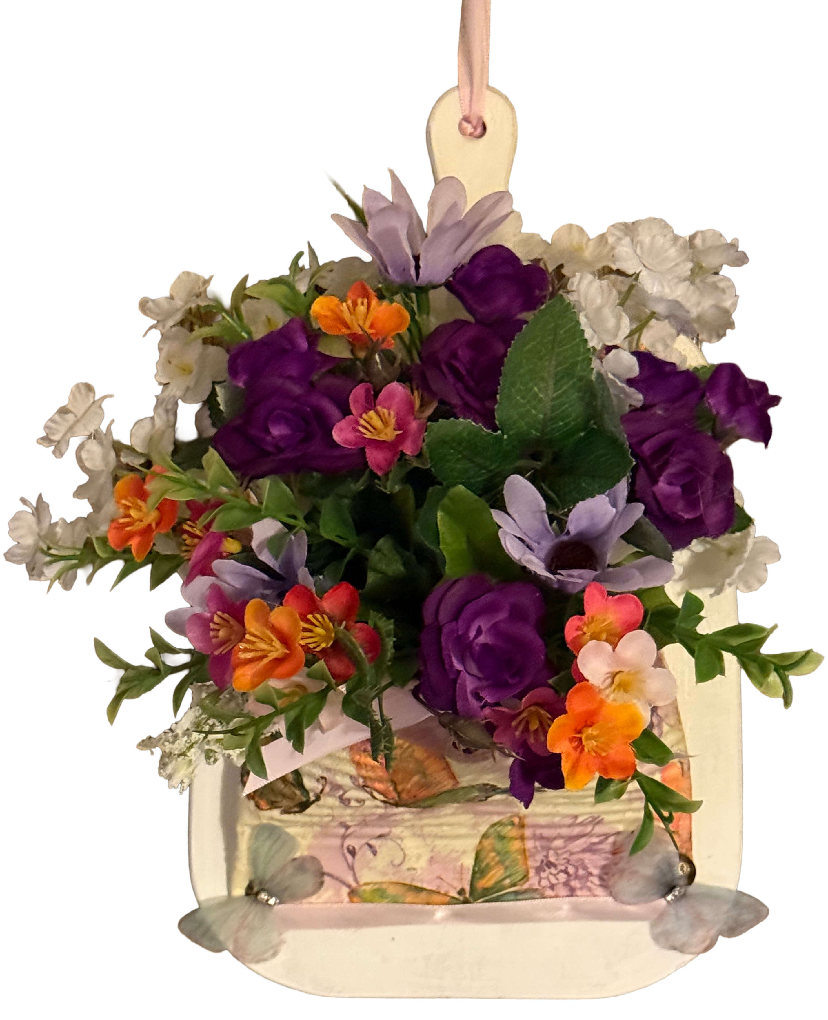 Decorative hanging basket with colorful flowers on a white background