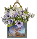 Decorative wall hanging with flowers and a deer illustration on a white background