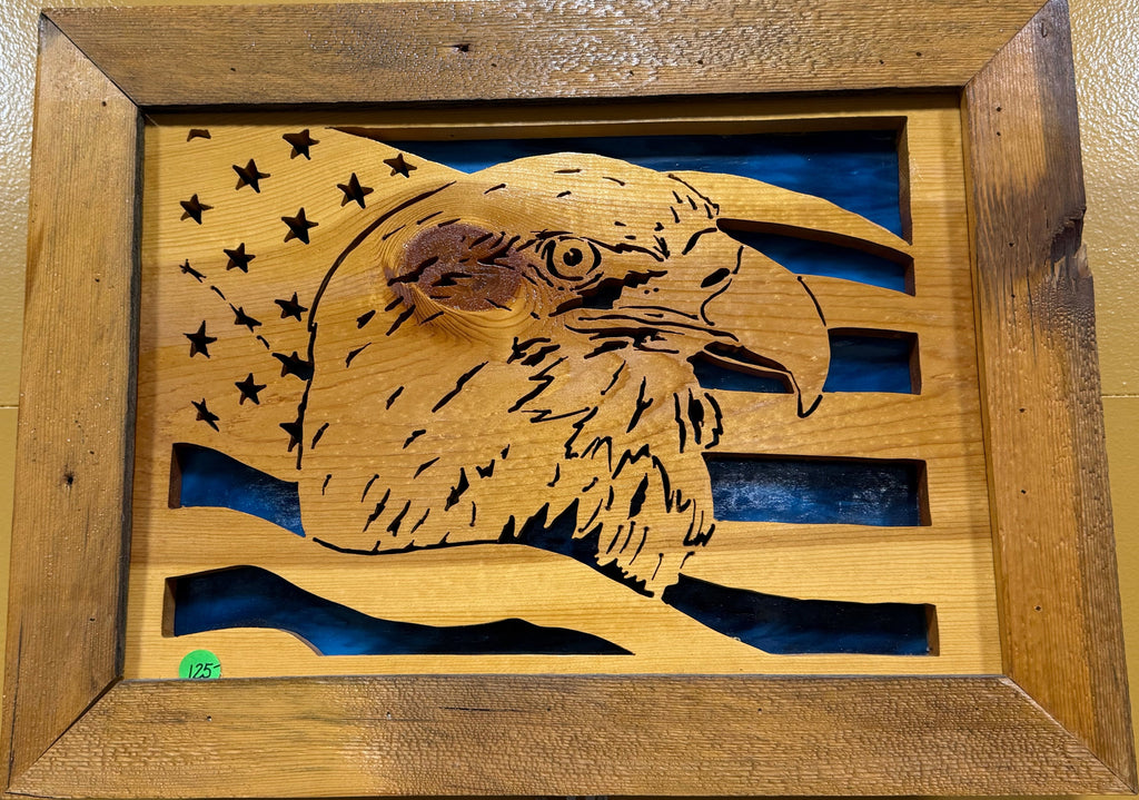 Lighted Shadow Box with scroll saw carving of a Bald Eagle and American Flag done by hand with a rustic wooden frame.