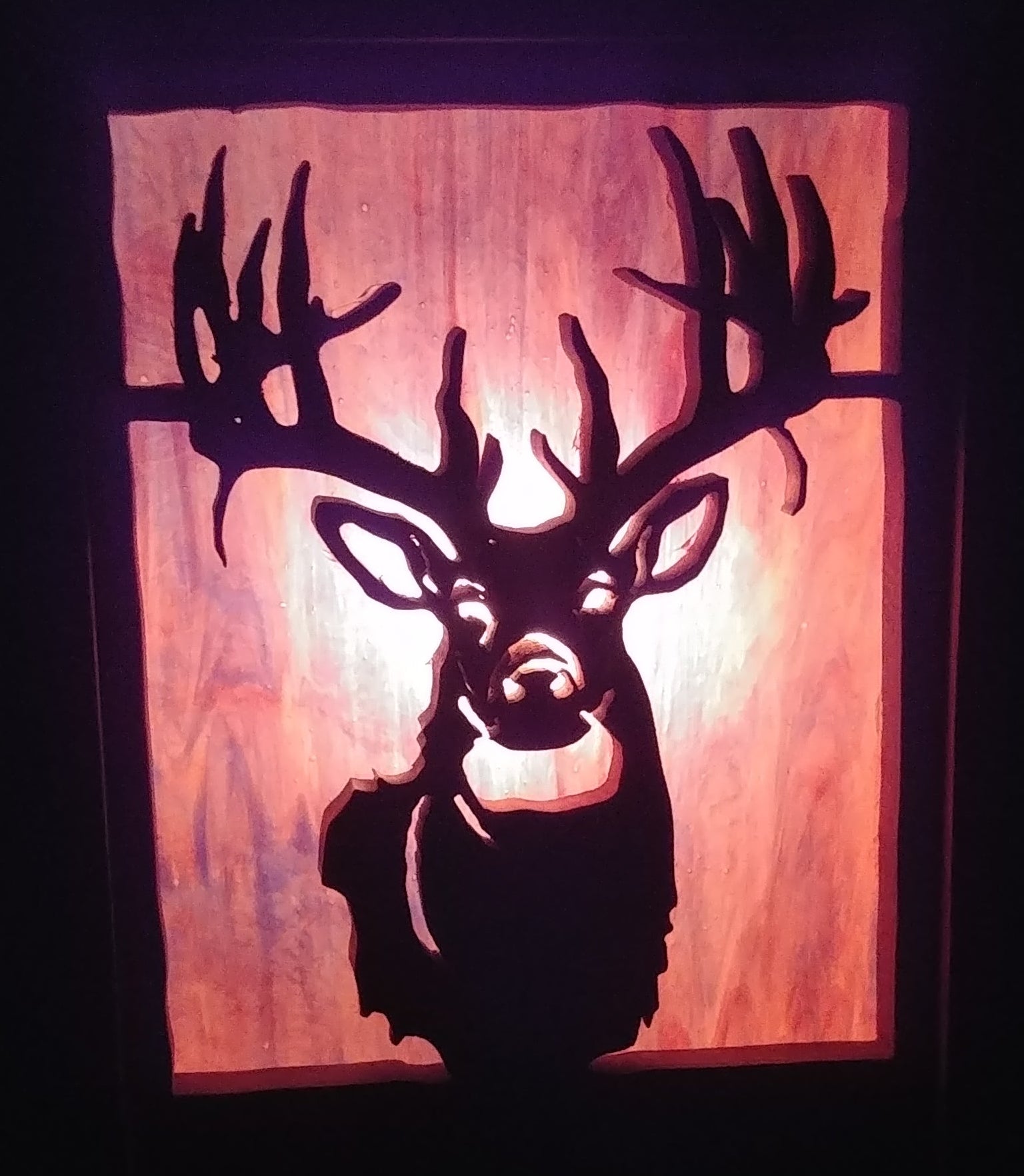 Lighted Shadow Box with scroll saw carving of a Elk done by hand with a rustic wooden frame.