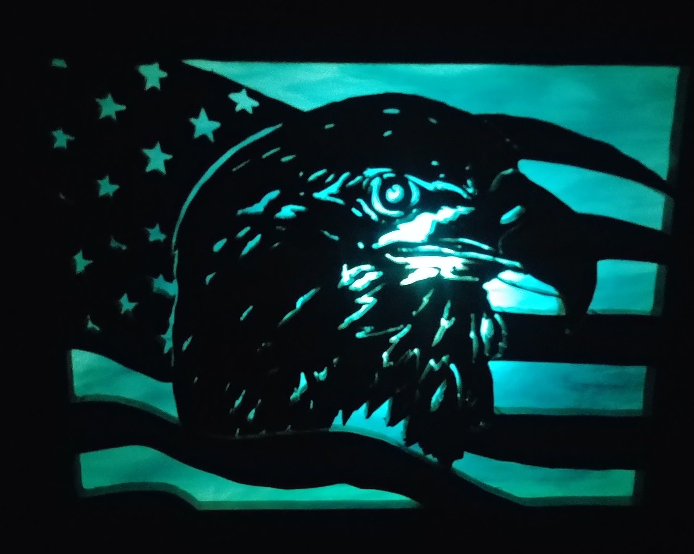 Lighted Shadow Box with scroll saw carving of a Bald Eagle and American Flag done by hand with a rustic wooden frame.