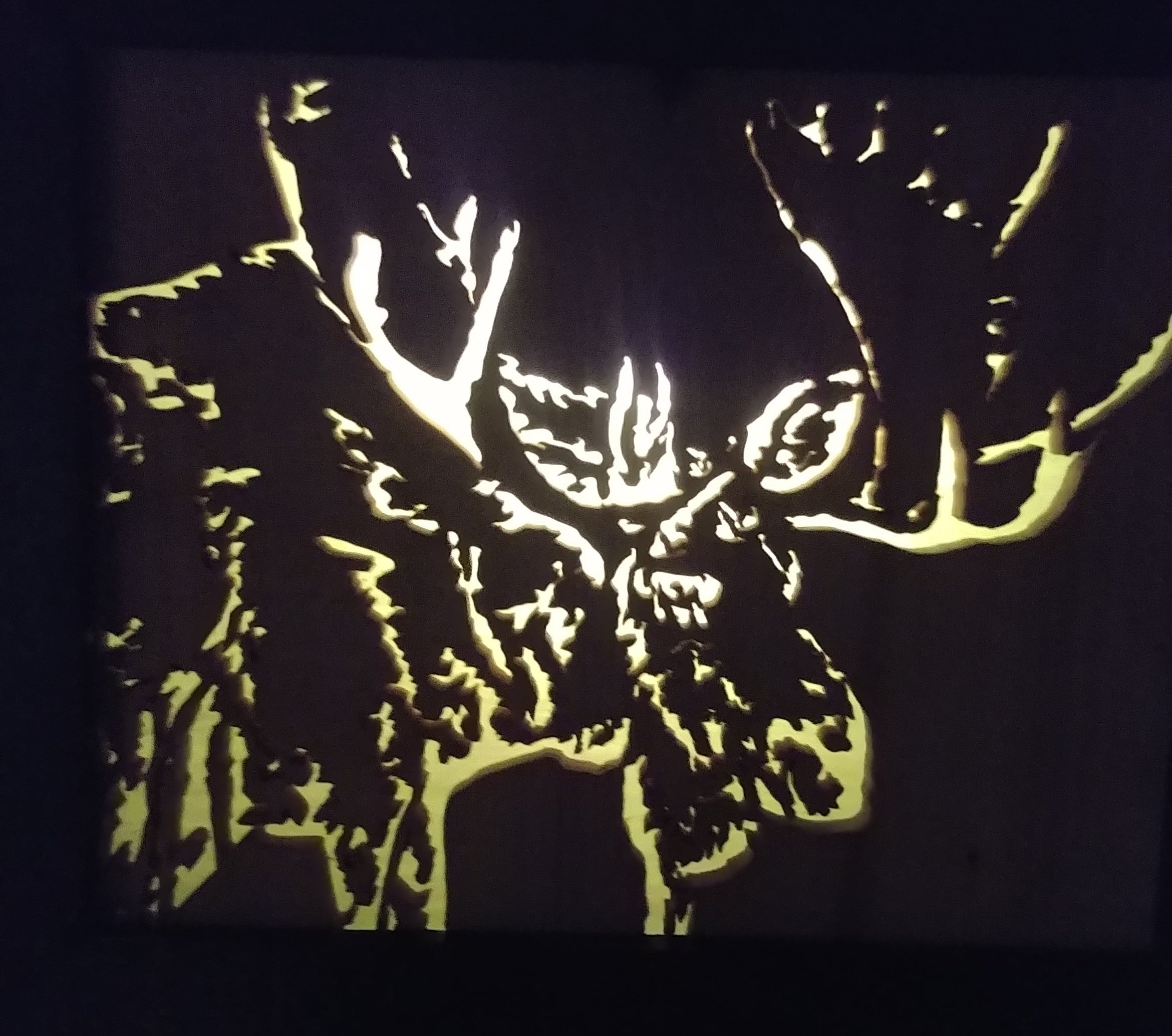 Lighted Shadow Box with scroll saw carving of a Moose done by hand with a rustic wooden frame.