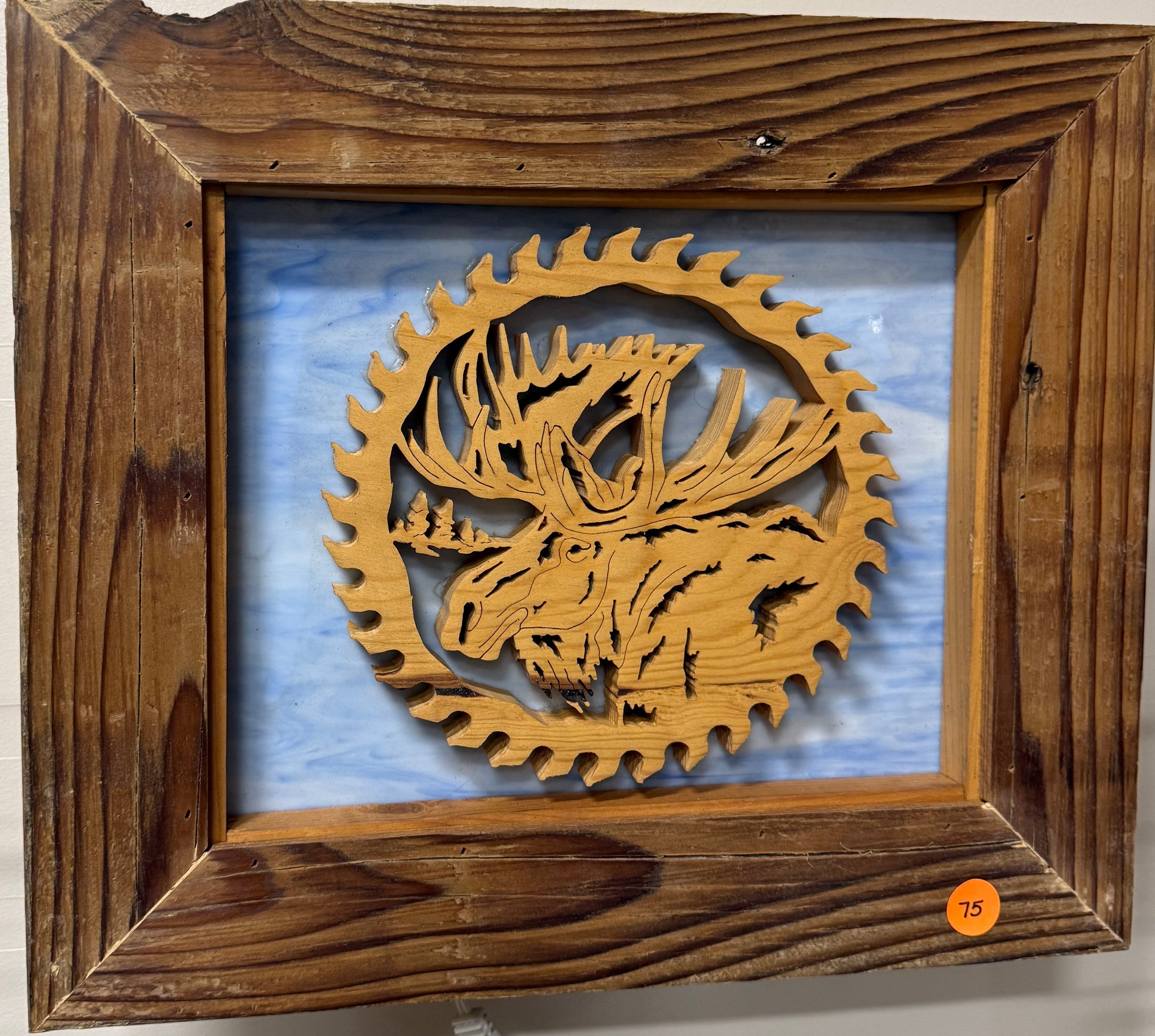 Lighted Shadow Box with scroll saw carving of a Moose in a gear done by hand with a rustic wooden frame.