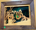 Lighted Shadow Box with scroll saw carving of a pair of wolves done by hand with a rustic wooden frame.