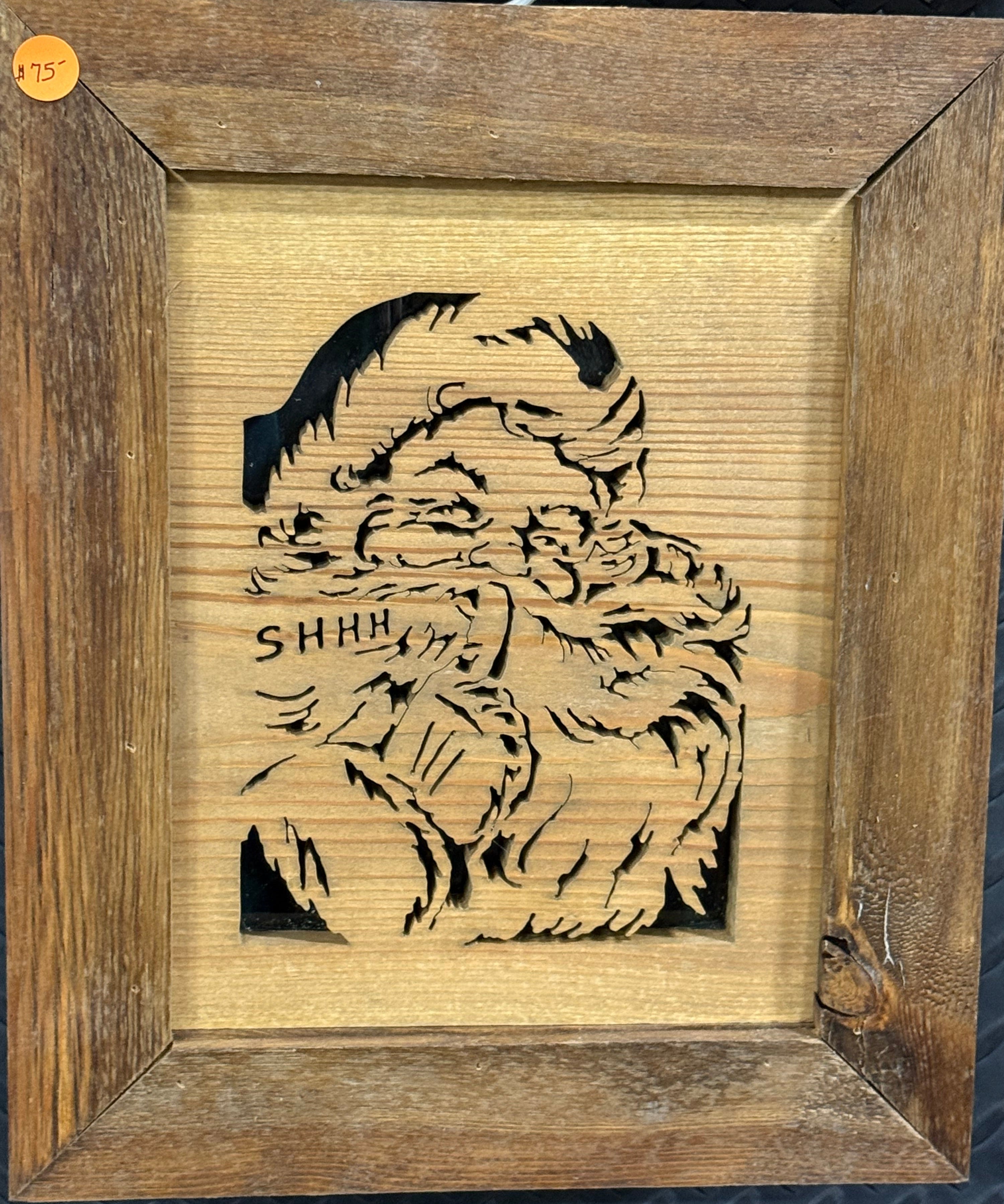 Lighted Shadow Box with scroll saw carving of Santa done by hand with a rustic wooden frame.