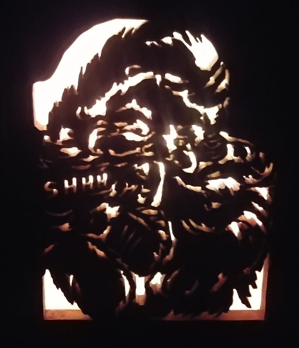 Lighted Shadow Box with scroll saw carving of Santa done by hand with a rustic wooden frame.