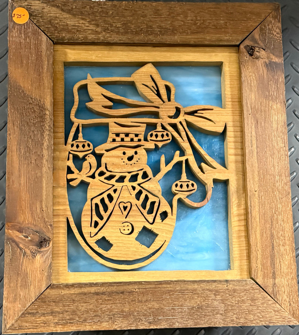 Lighted Shadow Box with scroll saw carving of a Snowman done by hand with a rustic wooden frame.