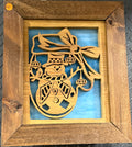 Lighted Shadow Box with scroll saw carving of a Snowman done by hand with a rustic wooden frame.