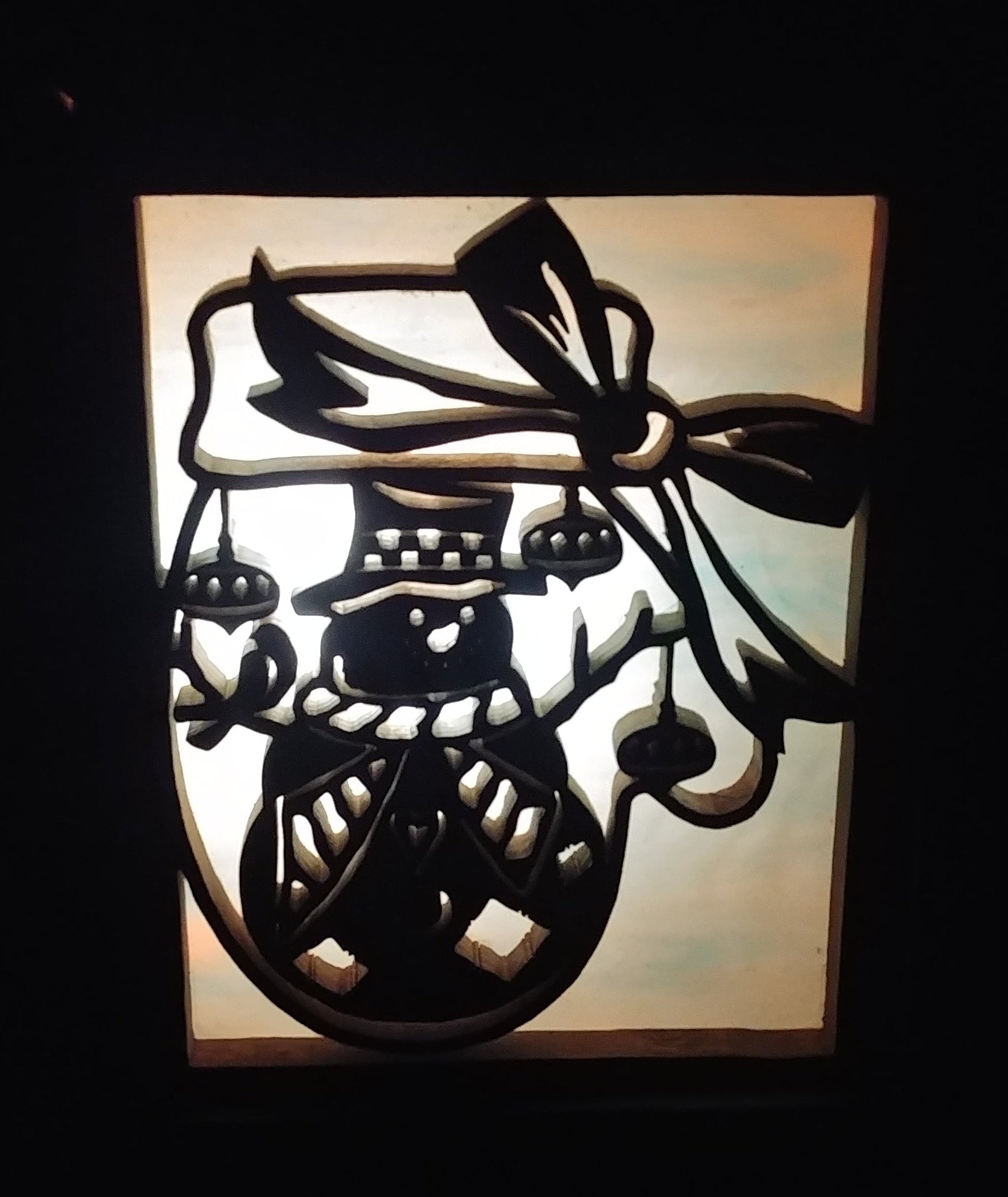 Lighted Shadow Box with scroll saw carving of Santa done by hand with a rustic wooden frame.