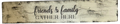 Wooden sign with 'friends & family gather here' text on a white background