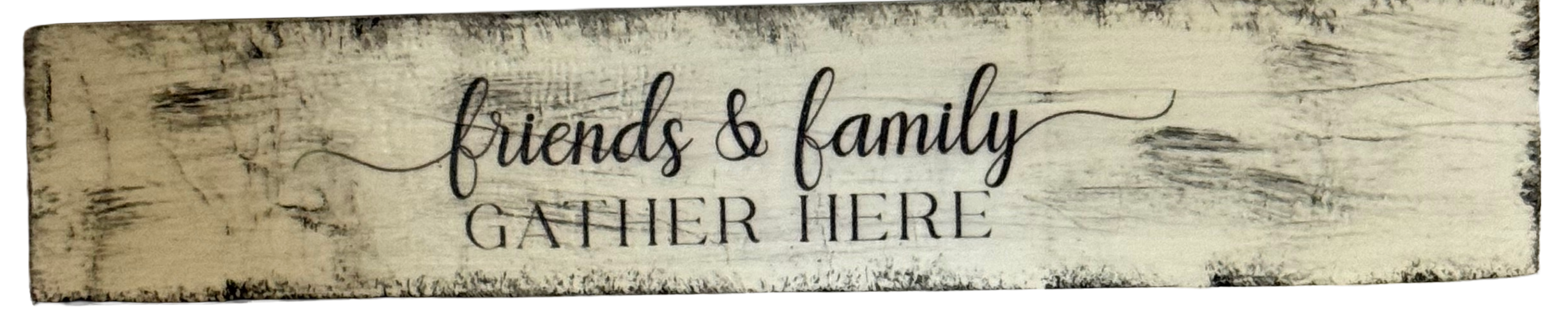 Wooden sign with 'friends & family gather here' text on a white background