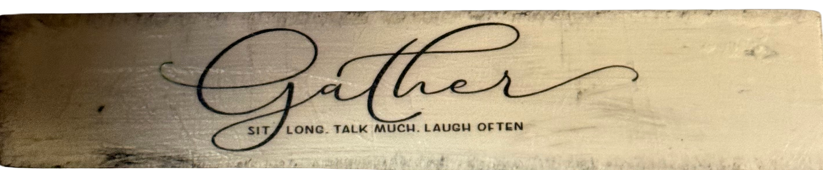 Wooden sign with 'Gather' and additional text on a white background
