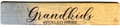 Wooden sign with 'Grandkids Spoiled Here' text on a white background