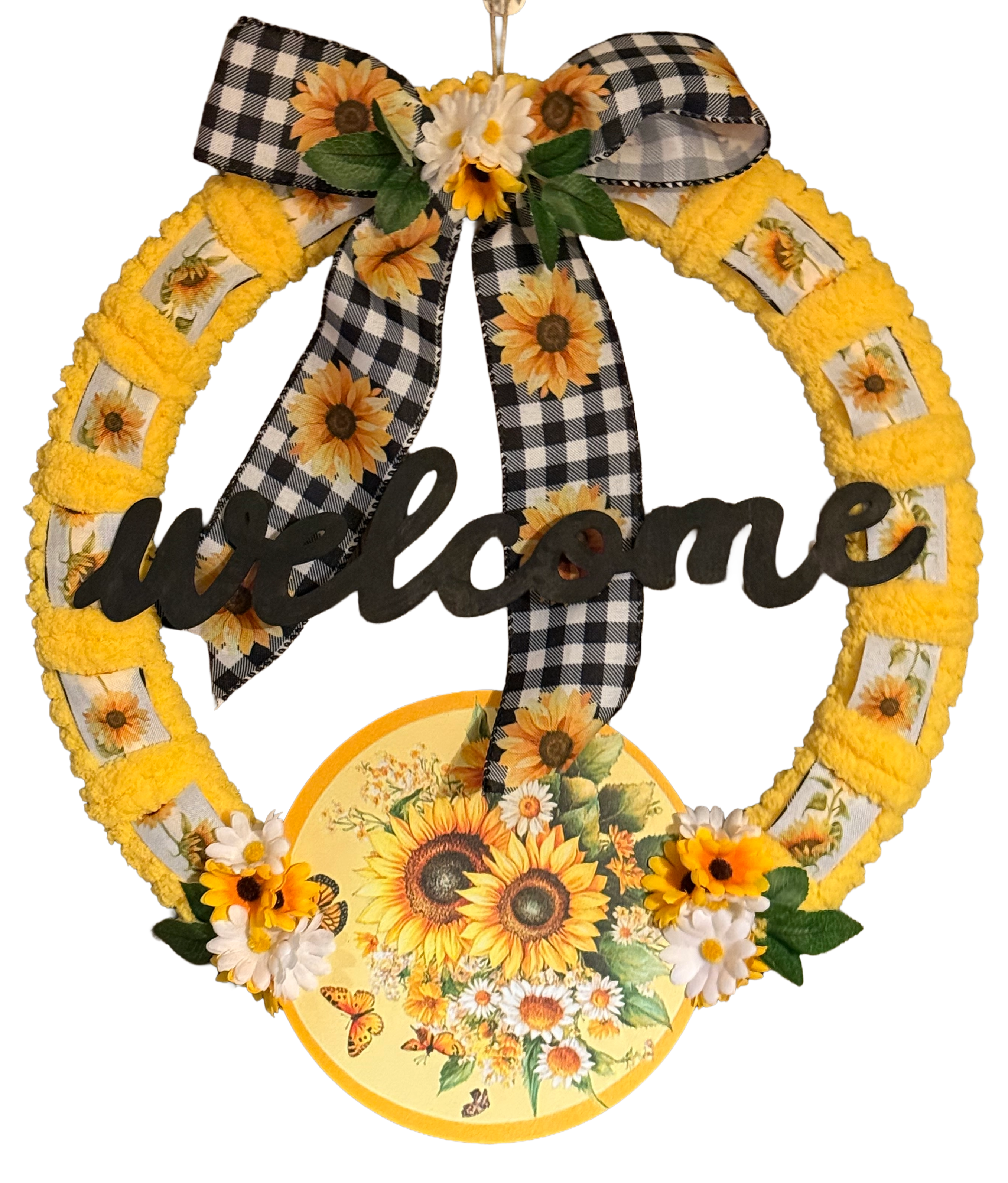Decorative wreath with sunflowers, checkered bow, and 'welcome' text on a white background